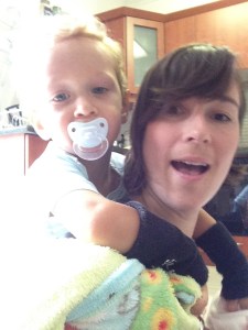 Yes. He's wearing Cross Fit exercise arm bands. 